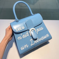 Delvaux Brillant L'Humour Lettering Blue / White