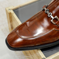 sapato ferragamo marrom.