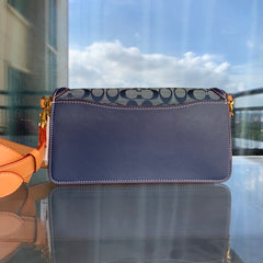 Bolsa Coach Tabby Shoulder Bag 26 in Signature Chambray.