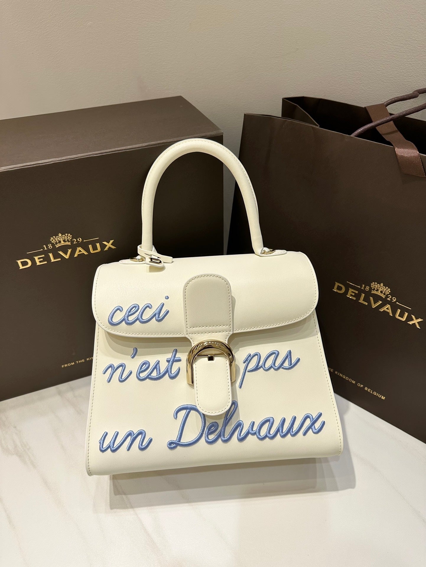 Delvaux Brillant L'Humour Lettering Off-White / Blue