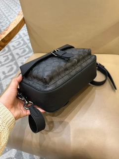 Bolsa Transversal Coach Warner em Canvas Signature Black